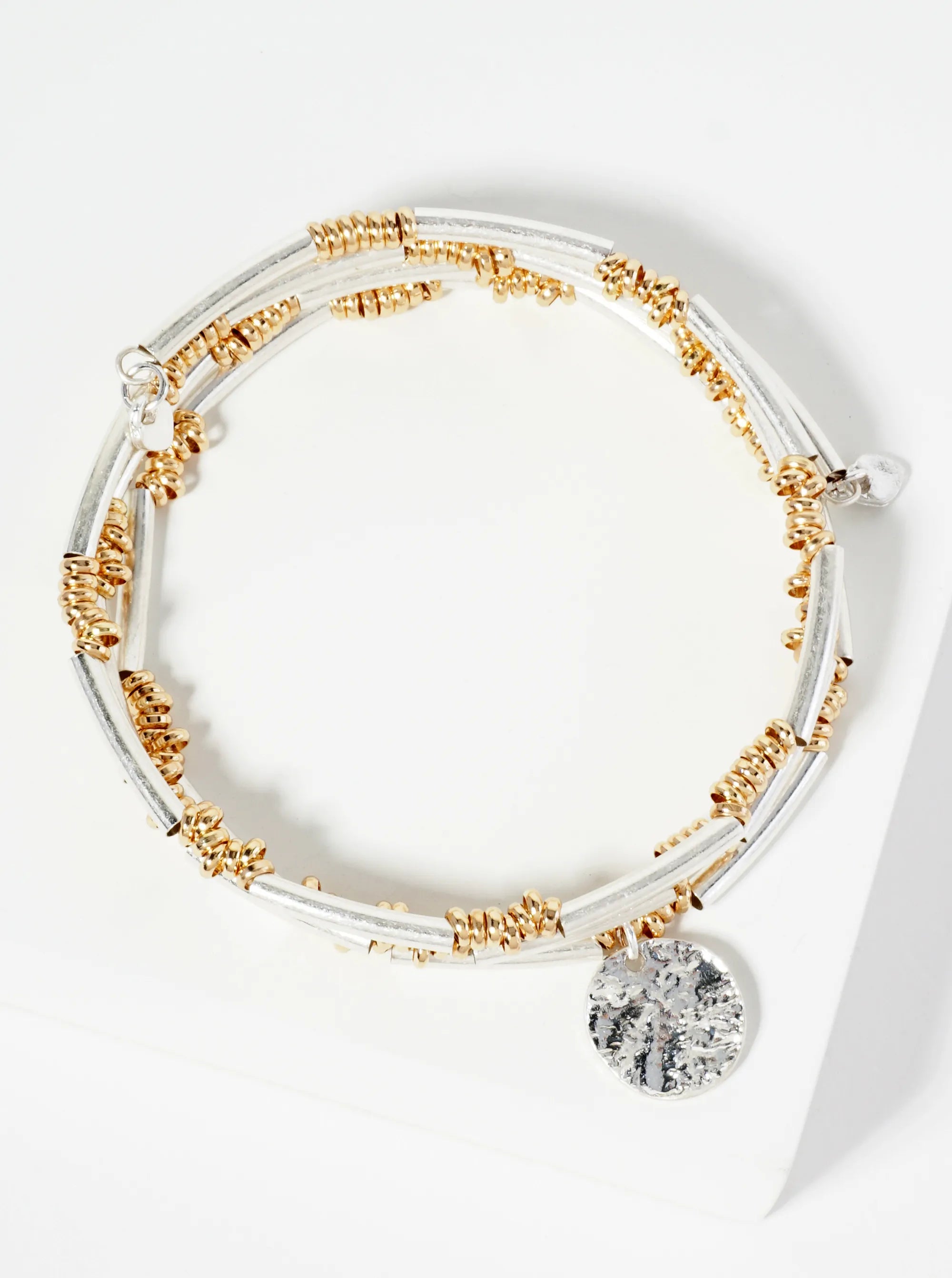 Dual-Tone Elastic Spring Bracelet With Hammered Disc Charm