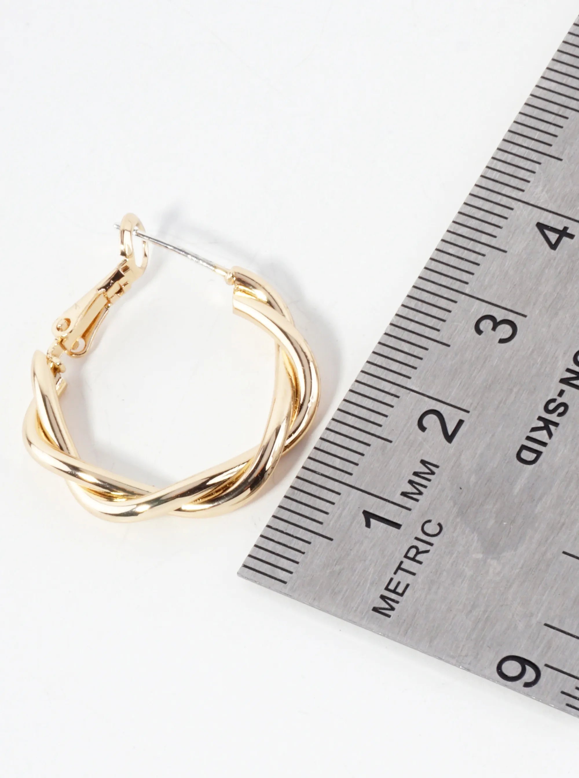 Polished Metal 25mm Twist Hinged Hoop Earrings