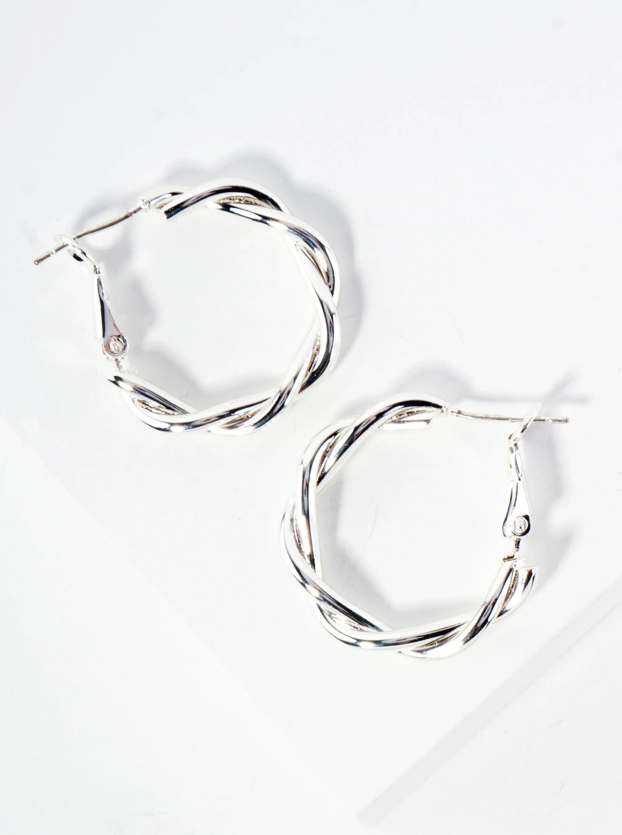 Polished Metal 25mm Twist Omega-Back Hoop Earrings